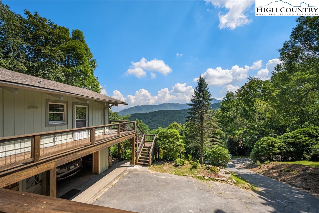 281 Cliffside Lane Seven Devils, NC 28604 - Photo 3 of 29 a view of a back yard of the house