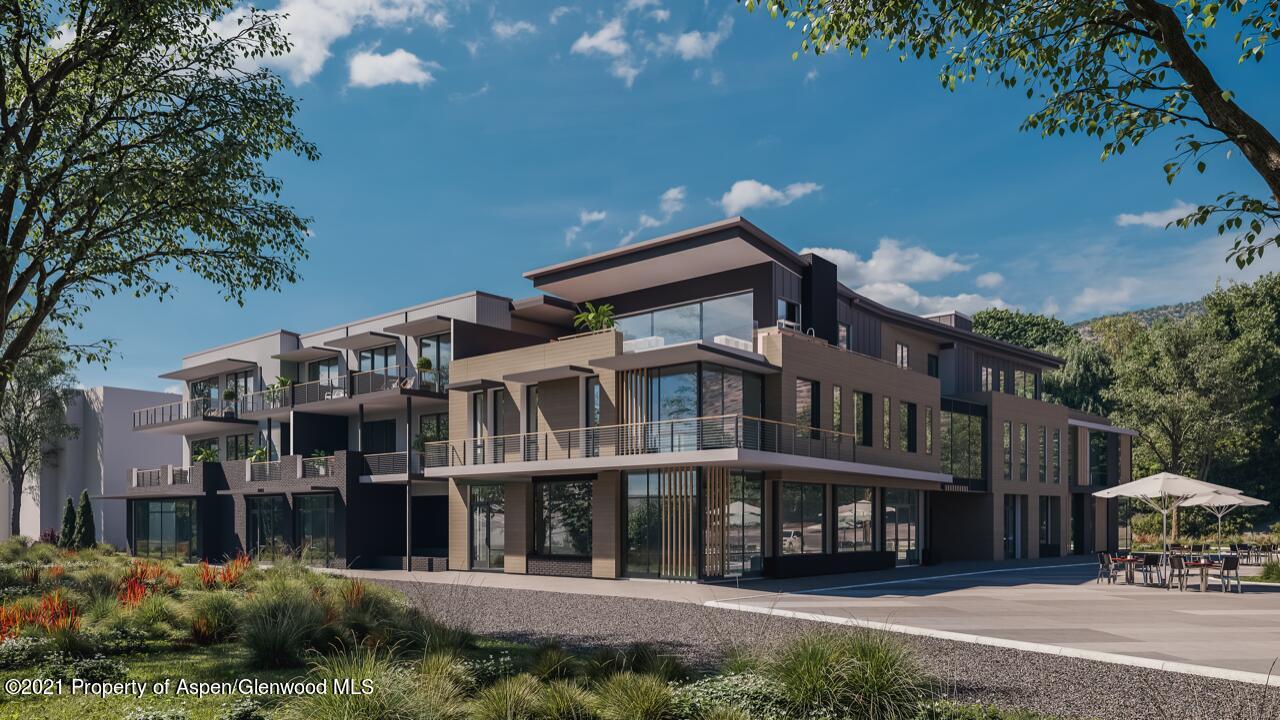22860 2 Rivers Road, Unit THE RIVER LOFTS 370 Basalt, CO 81621 - Photo 3 of 7 a front view of a building with a garden