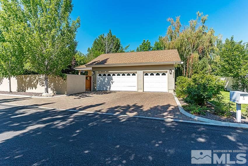 4655 Lakewood Court Reno, NV 89509 - Photo 21 of 21 a house with trees in the background