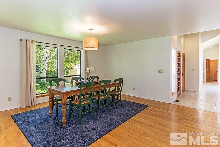 4655 Lakewood Court Reno, NV 89509 - Photo 6 of 21 a dining room with furniture and wooden floor
