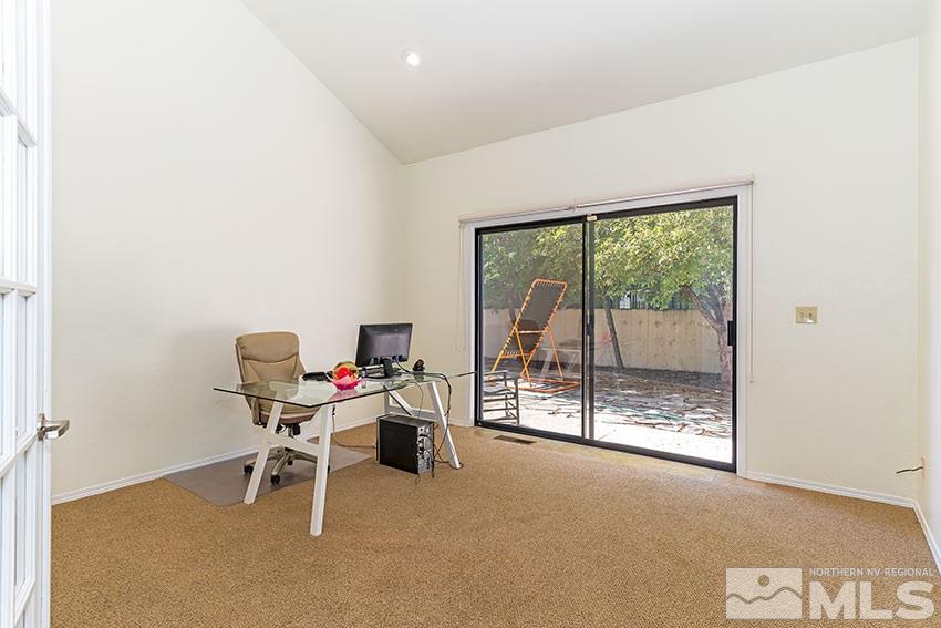 4655 Lakewood Court Reno, NV 89509 - Photo 9 of 21 a work room with a glass door and furniture