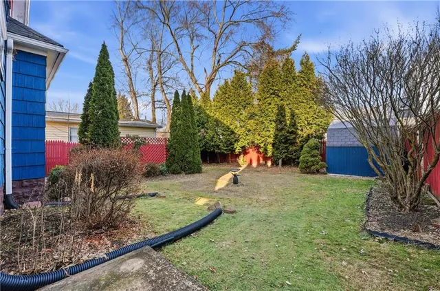 a view of a house with a street