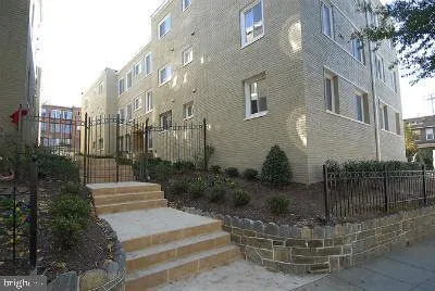 a view of a house with a garden