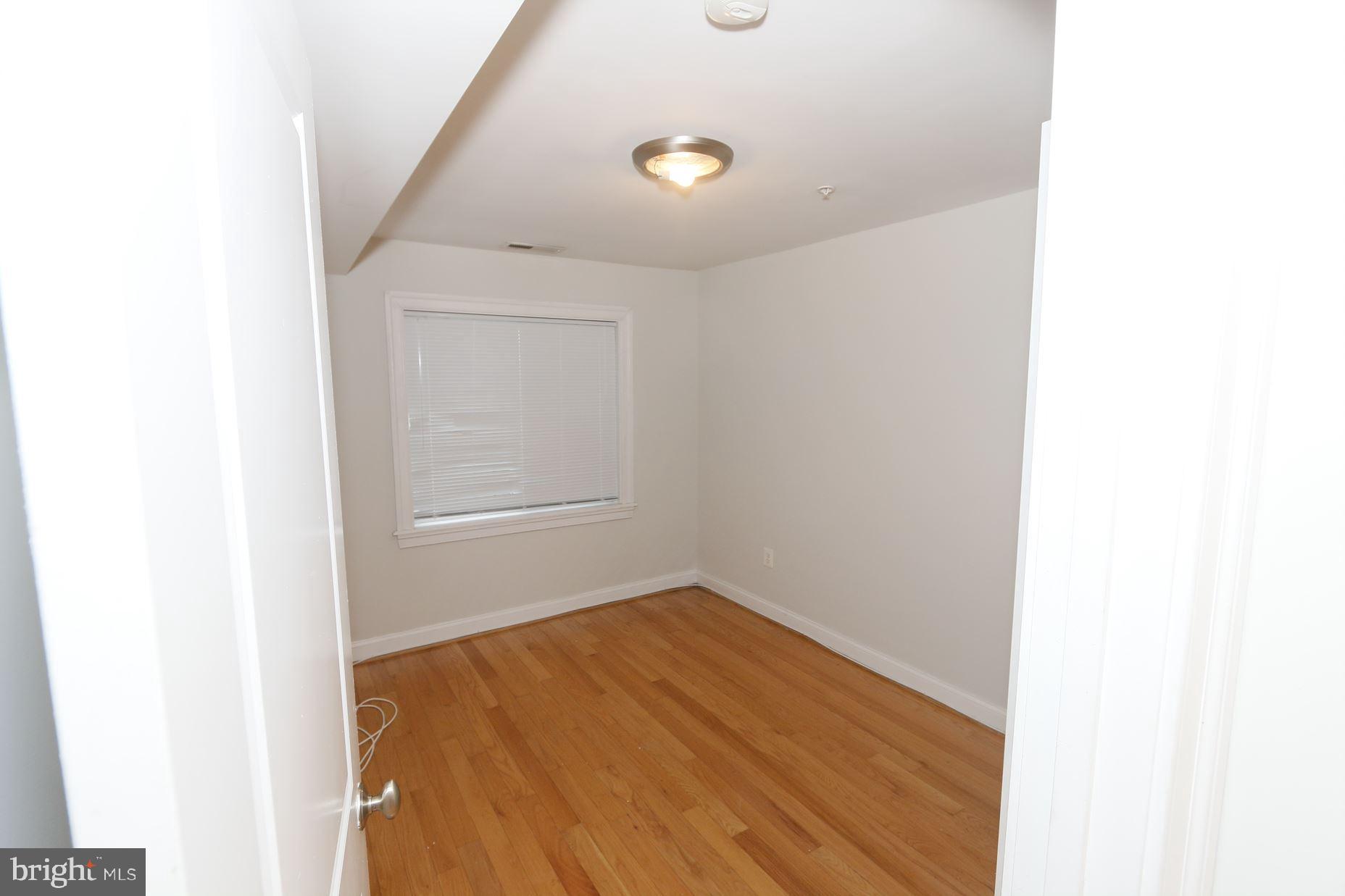 1901 Lincoln Road Northeast, Unit 101 Washington, DC 20002 - Photo 9 of 17 a view of an empty room