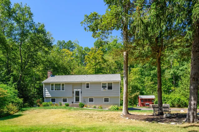 front view of a house with a yard