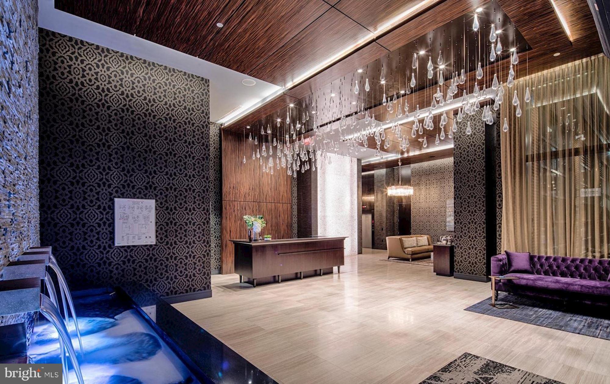 45 Sutton Square Southwest, Unit 1112 Washington, DC 20024 - Photo 2 of 46 Elegant lobby with modern design elements.