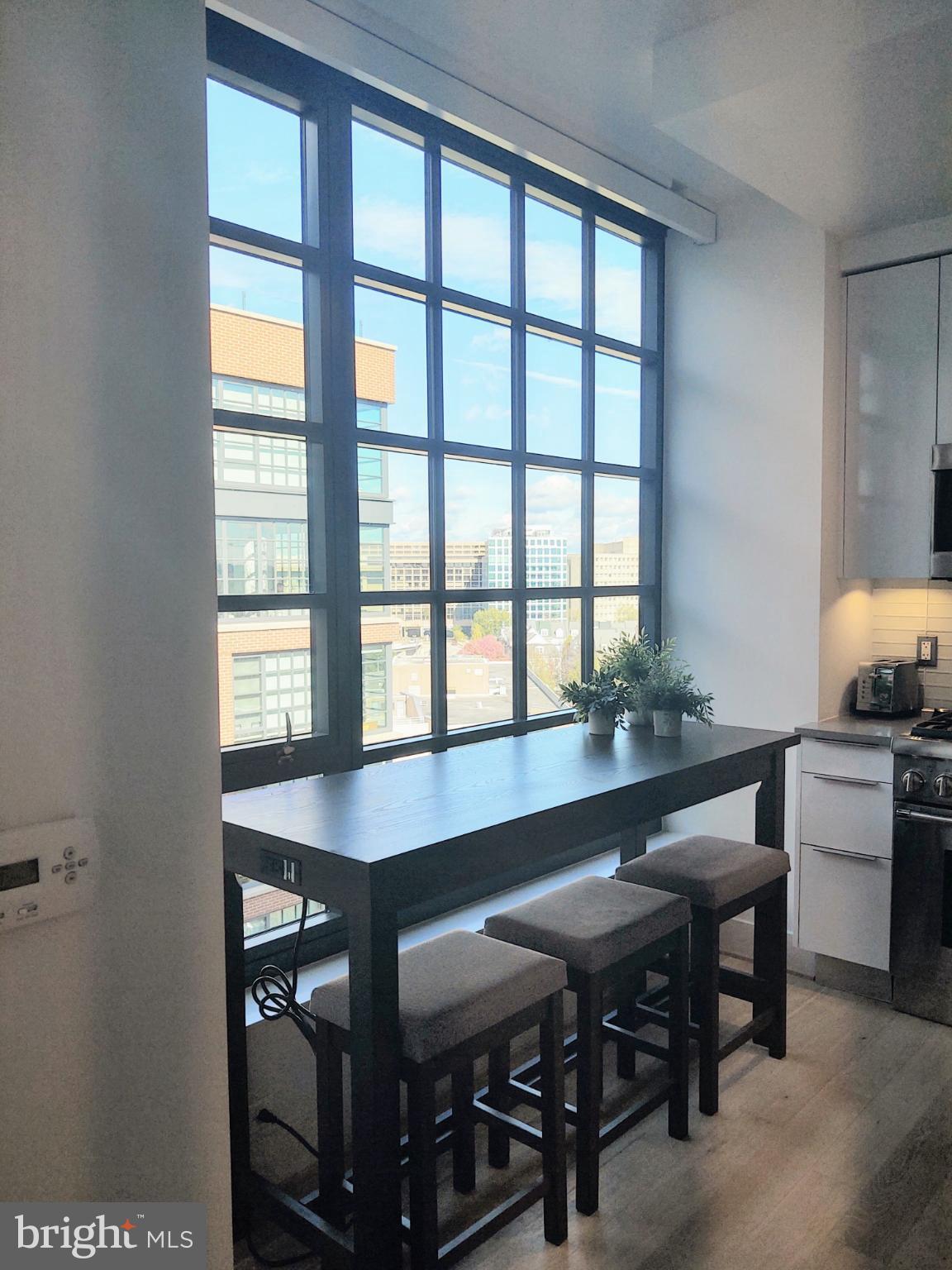 45 Sutton Square Southwest, Unit 1112 Washington, DC 20024 - Photo 8 of 46 Dine, work, & read with city views.