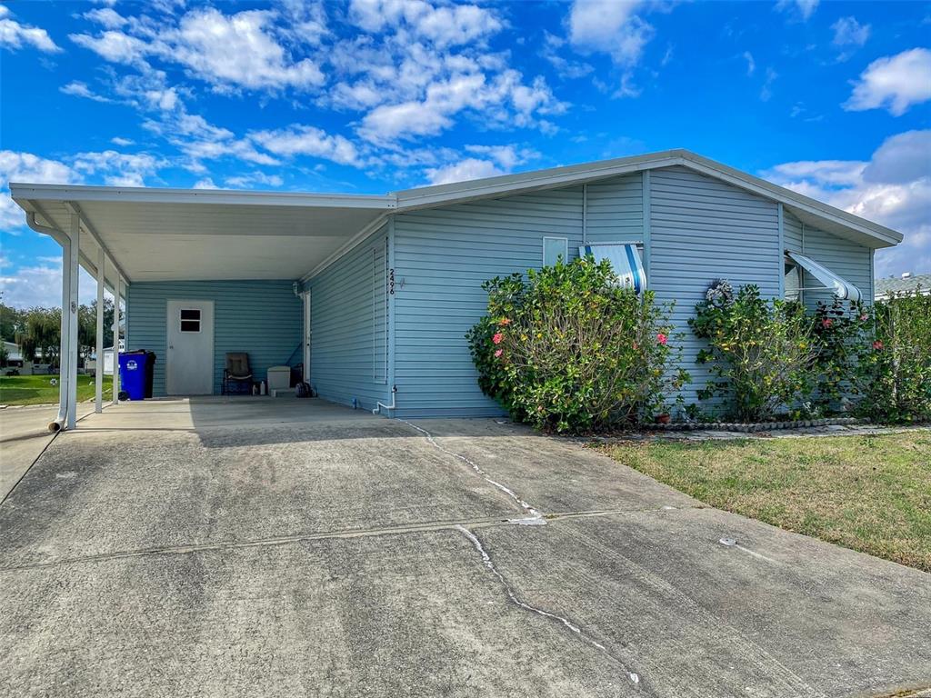 2496 Independence Lane St. Cloud, FL 34772 - Photo 1 of 1 a view of a house with backyard