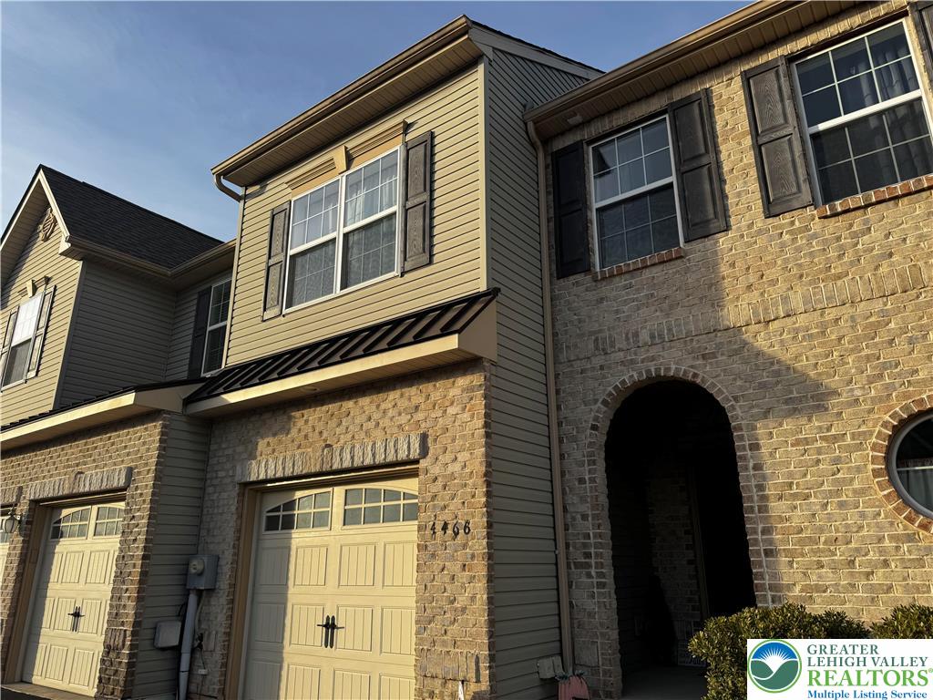 4466 Cottonwood Drive Nazareth, PA 18064 - Photo 1 of 22 a front view of a house with a door