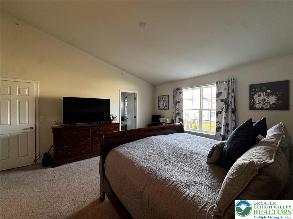 4466 Cottonwood Drive Nazareth, PA 18064 - Photo 18 of 22 a bedroom with a bed and a television