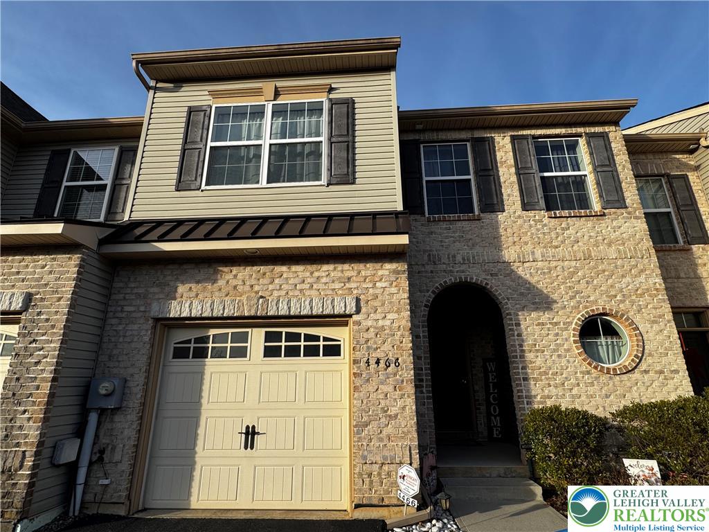 4466 Cottonwood Drive Nazareth, PA 18064 - Photo 2 of 22 a front view of a house with a door