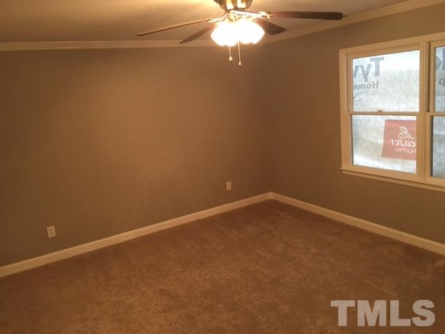 2324 Merganzer Road Raleigh, NC 27616 - Photo 5 of 9 an empty room with a window