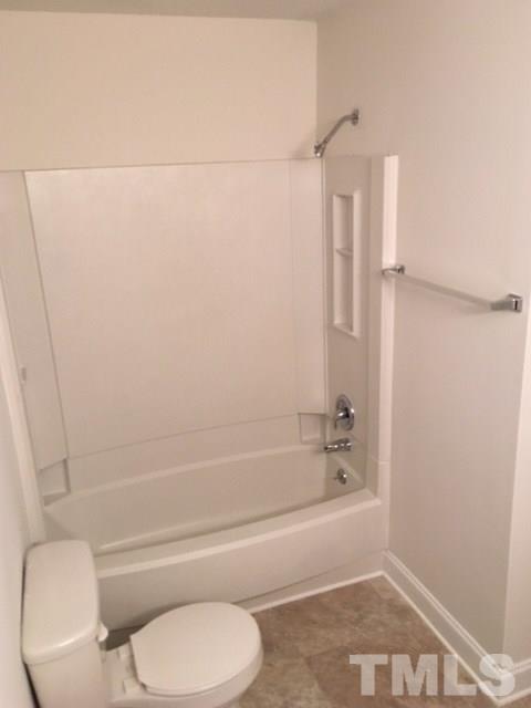 2324 Merganzer Road Raleigh, NC 27616 - Photo 9 of 9 a bathroom with a toilet and a bathtub