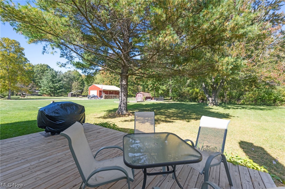 38484 Otten Road North Ridgeville, OH 44039 - Photo 32 of 32 Wooden deck with a lawn