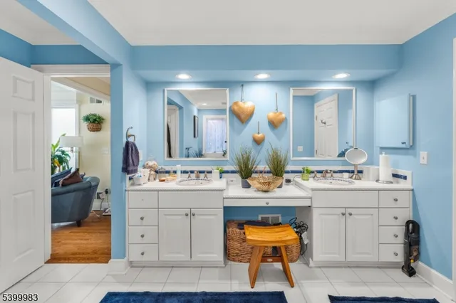 a view of a sink and a mirror