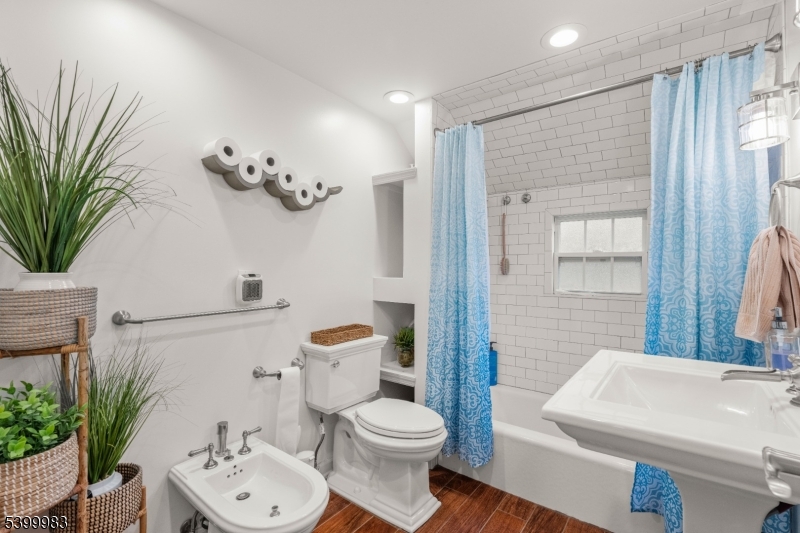 300 Old Farm Road Bedminster, NJ 07921 - Photo 18 of 38 a bathroom with a sink a toilet and a mirror
