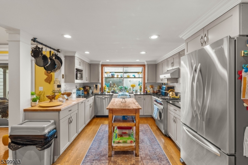 300 Old Farm Road Bedminster, NJ 07921 - Photo 3 of 38 a kitchen with sink a refrigerator and a stove