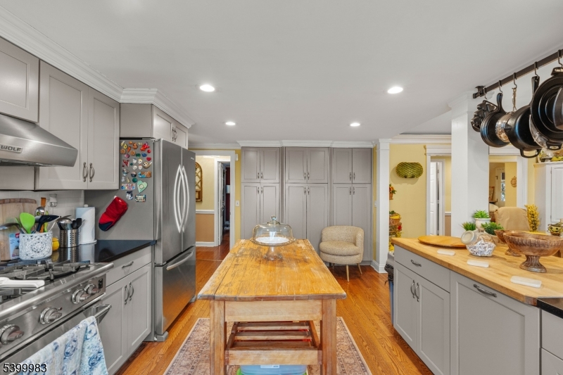 300 Old Farm Road Bedminster, NJ 07921 - Photo 8 of 38 a spacious bathroom with a granite countertop sink and a mirror