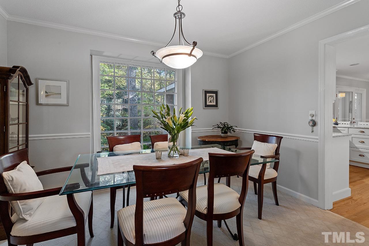 2408 Wentworth Street Raleigh, NC 27612 - Photo 15 of 33 a view of a dining room with furniture window and outside view