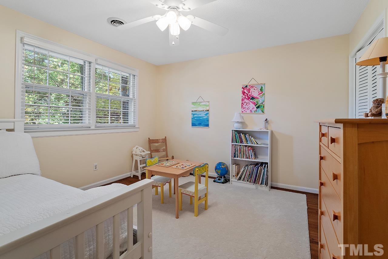2408 Wentworth Street Raleigh, NC 27612 - Photo 26 of 33 a workspace with furniture and window