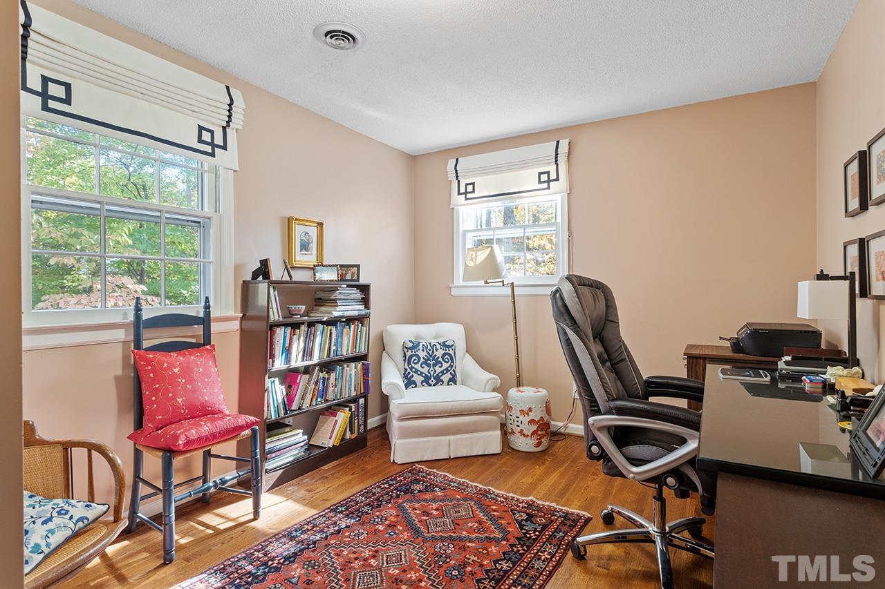2408 Wentworth Street Raleigh, NC 27612 - Photo 29 of 33 a work room with furniture and a window