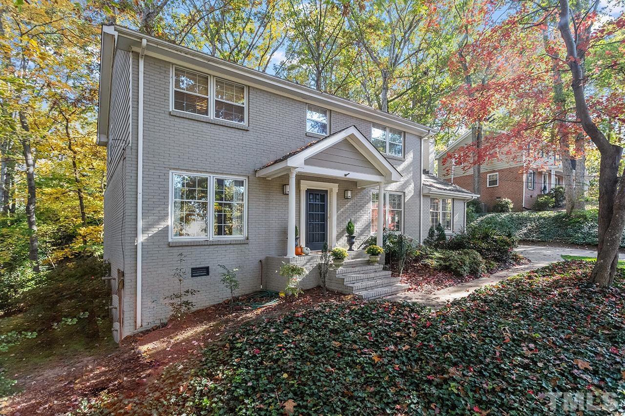 2408 Wentworth Street Raleigh, NC 27612 - Photo 3 of 33 a front view of a house with garden