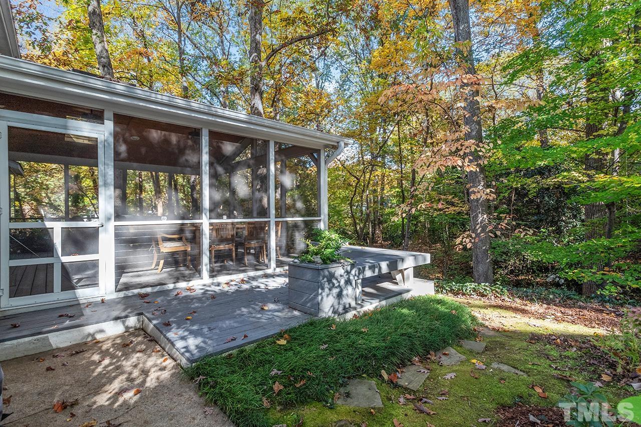 2408 Wentworth Street Raleigh, NC 27612 - Photo 32 of 33 a view of a chair and table in backyard of the house