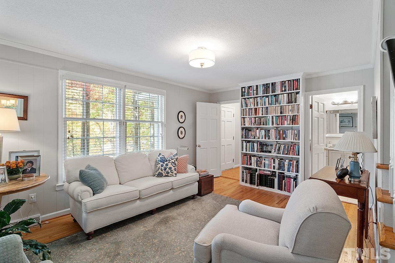 2408 Wentworth Street Raleigh, NC 27612 - Photo 9 of 33 a living room with furniture and a large window