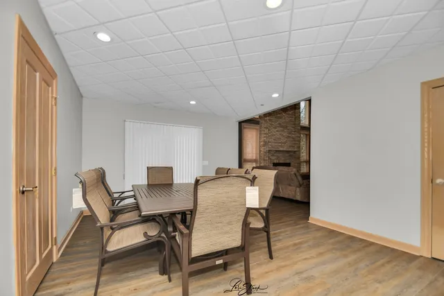 a view of a livingroom with furniture and lounge chair