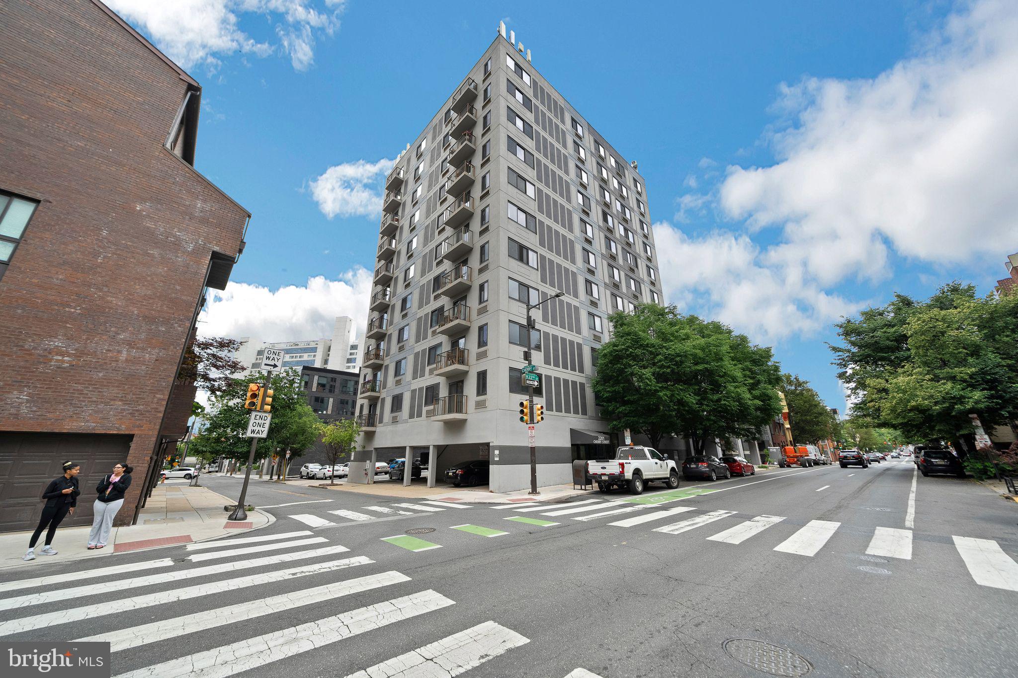 a view of a building with a street