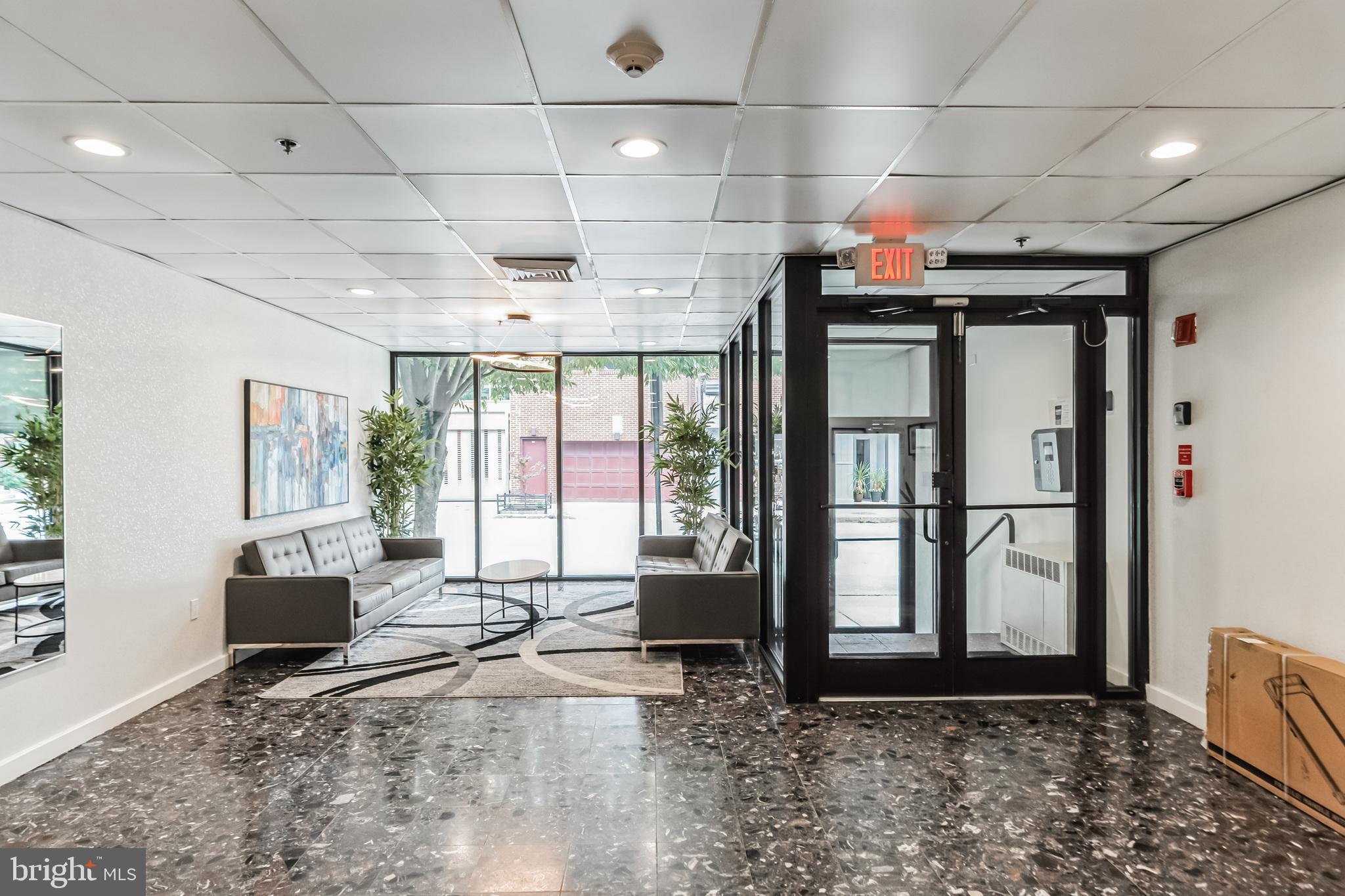2201 Cherry Street, Unit 603 Philadelphia, PA 19103 - Photo 4 of 32 a very nice looking room with a large window