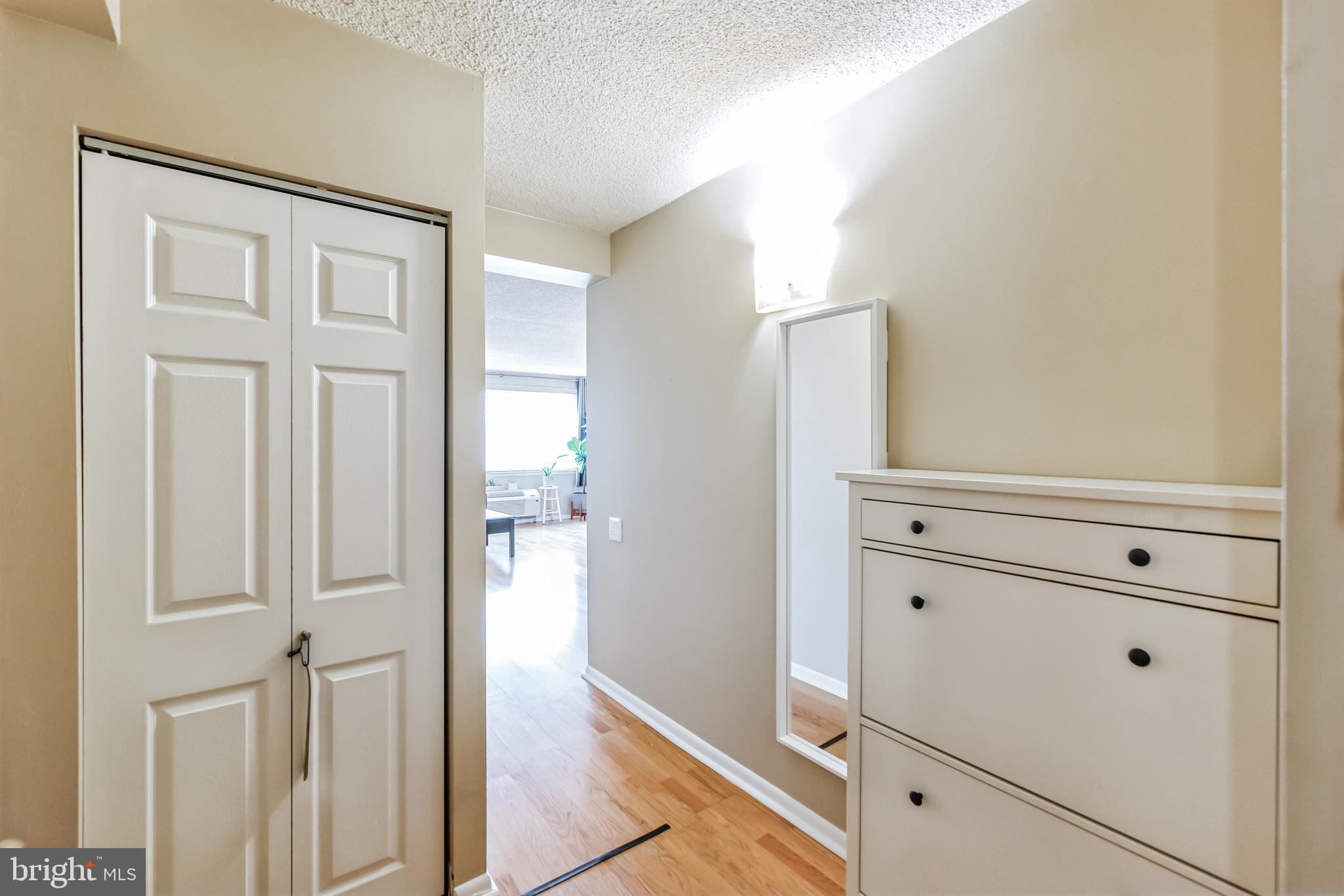 2201 Cherry Street, Unit 603 Philadelphia, PA 19103 - Photo 6 of 32 a view of a dresser