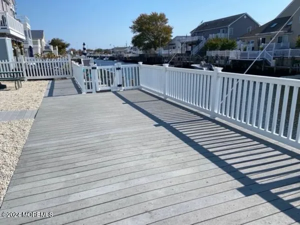 a view of balcony with deck and city view