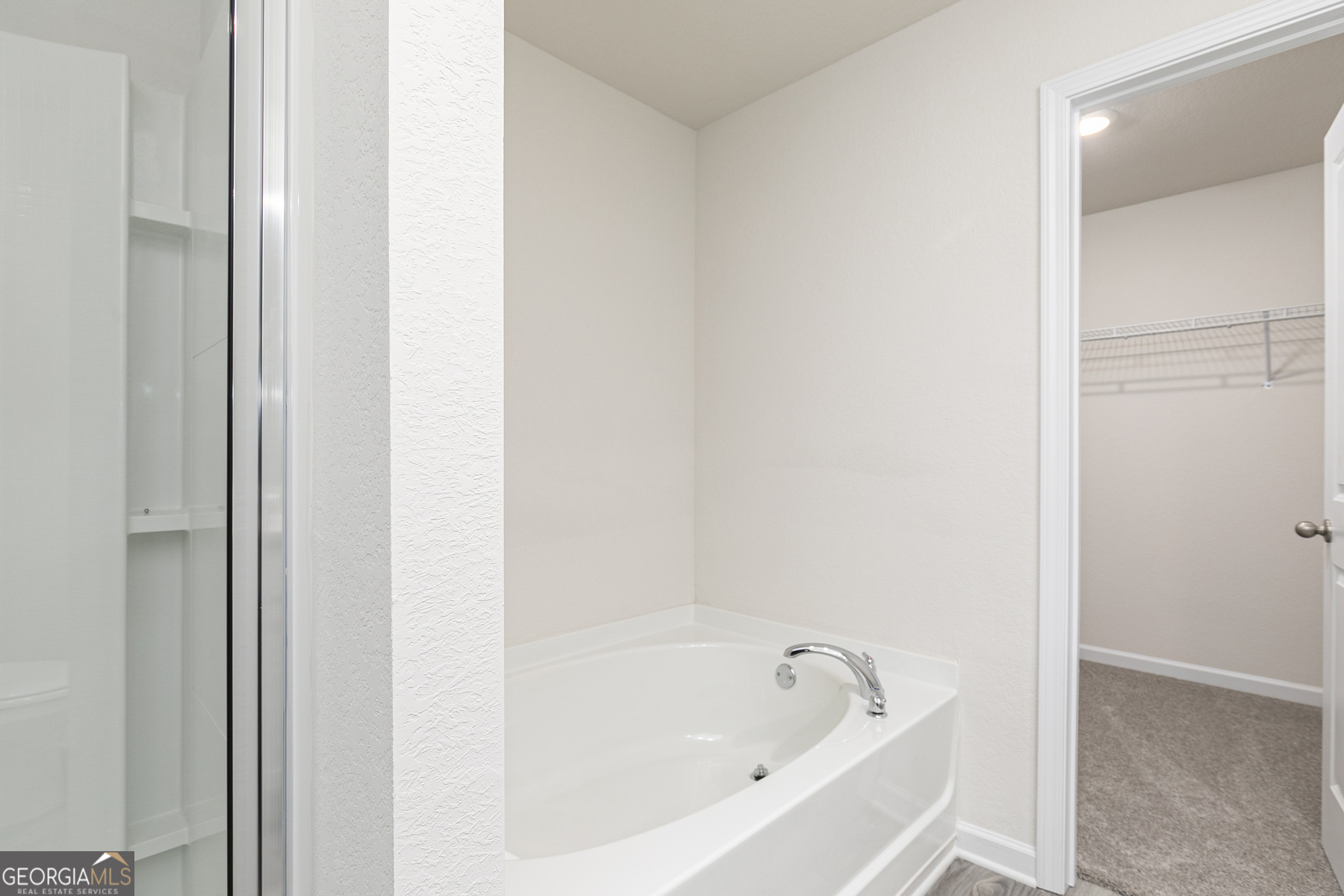 620 Slate Road Conyers, GA 30013 - Photo 16 of 22 a white bath tub sitting next to a white sink