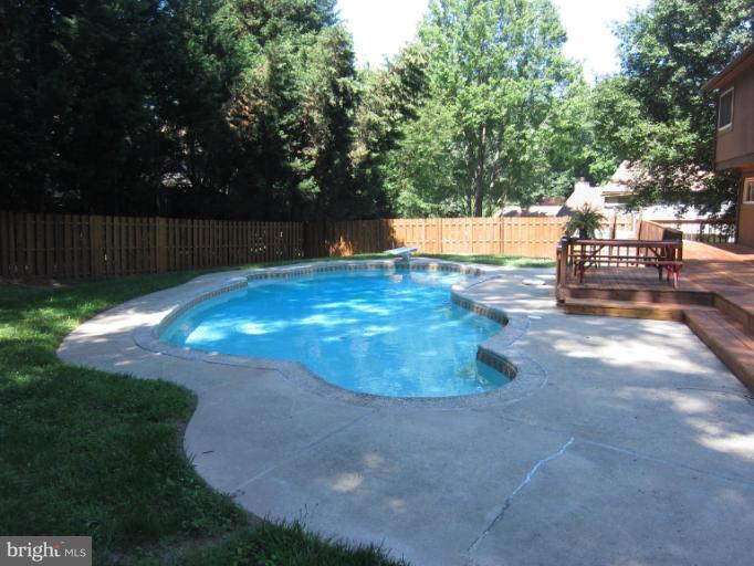 14905 Wellwood Road Silver Spring, MD 20905 - Photo 28 of 30 Beautiful inground pool with patio, full deck