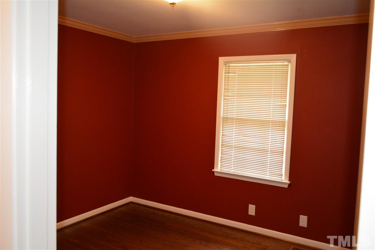2604 Patrick Road Raleigh, NC 27604 - Photo 6 of 9 an empty room with a window