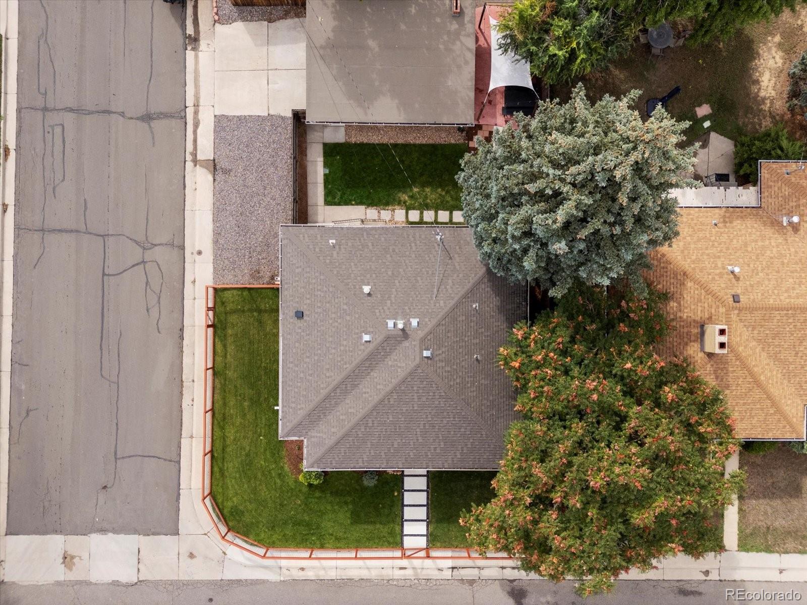 4963 North Harlan Street Wheat Ridge, CO 80033 - Photo 40 of 42 an aerial view of a house