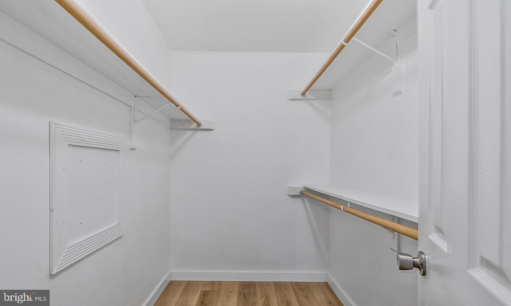 20991 Timber Ridge Terrace, Unit 103 Ashburn, VA 20147 - Photo 22 of 58 a view of small space with racks on the wall