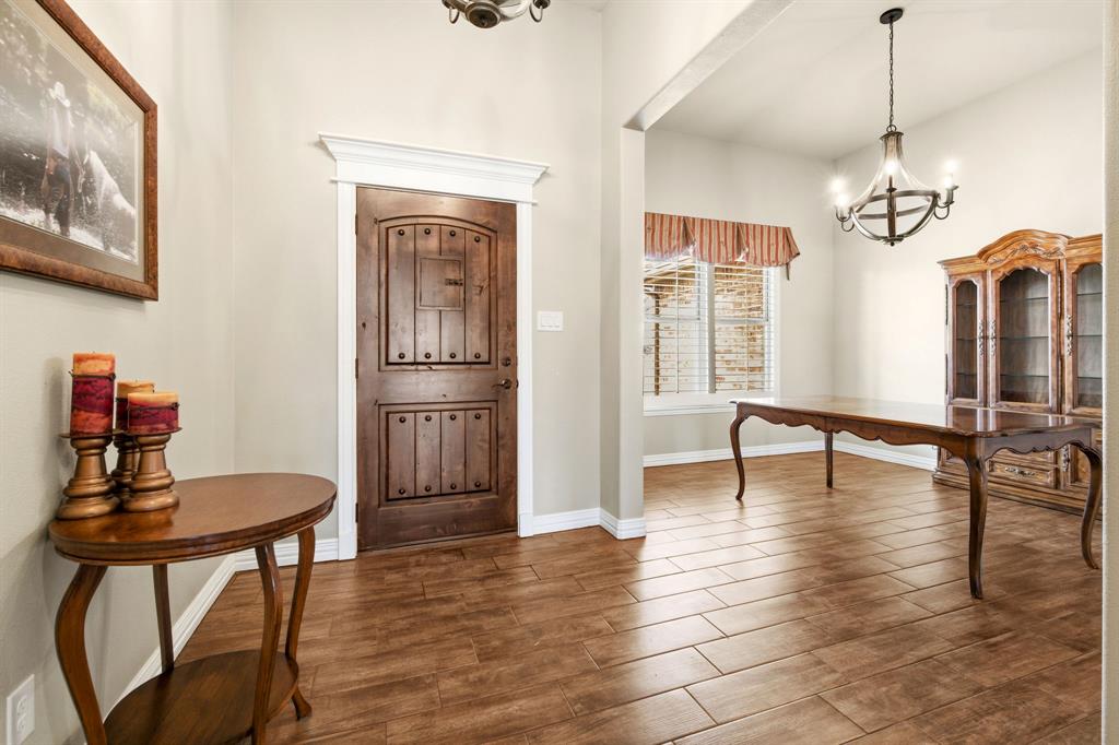 146 Mesquite Ridge Lane Lawn, TX 79530 - Photo 2 of 40 a view of a livingroom with furniture window and wooden floor