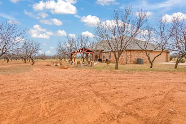 a view of snow on the road