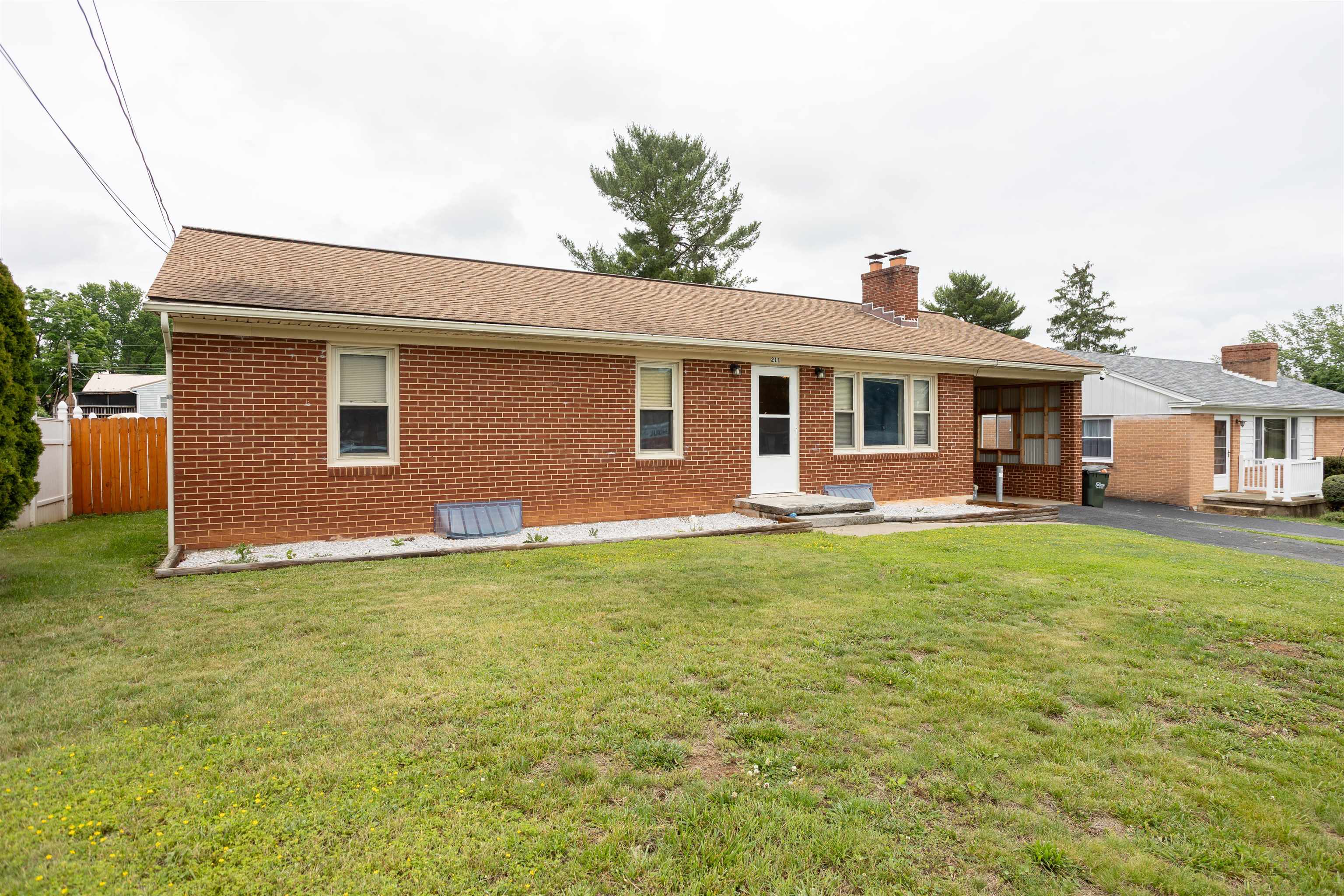 211 George Street Staunton, VA 24401 - Photo 26 of 37 a front view of a house with a garden