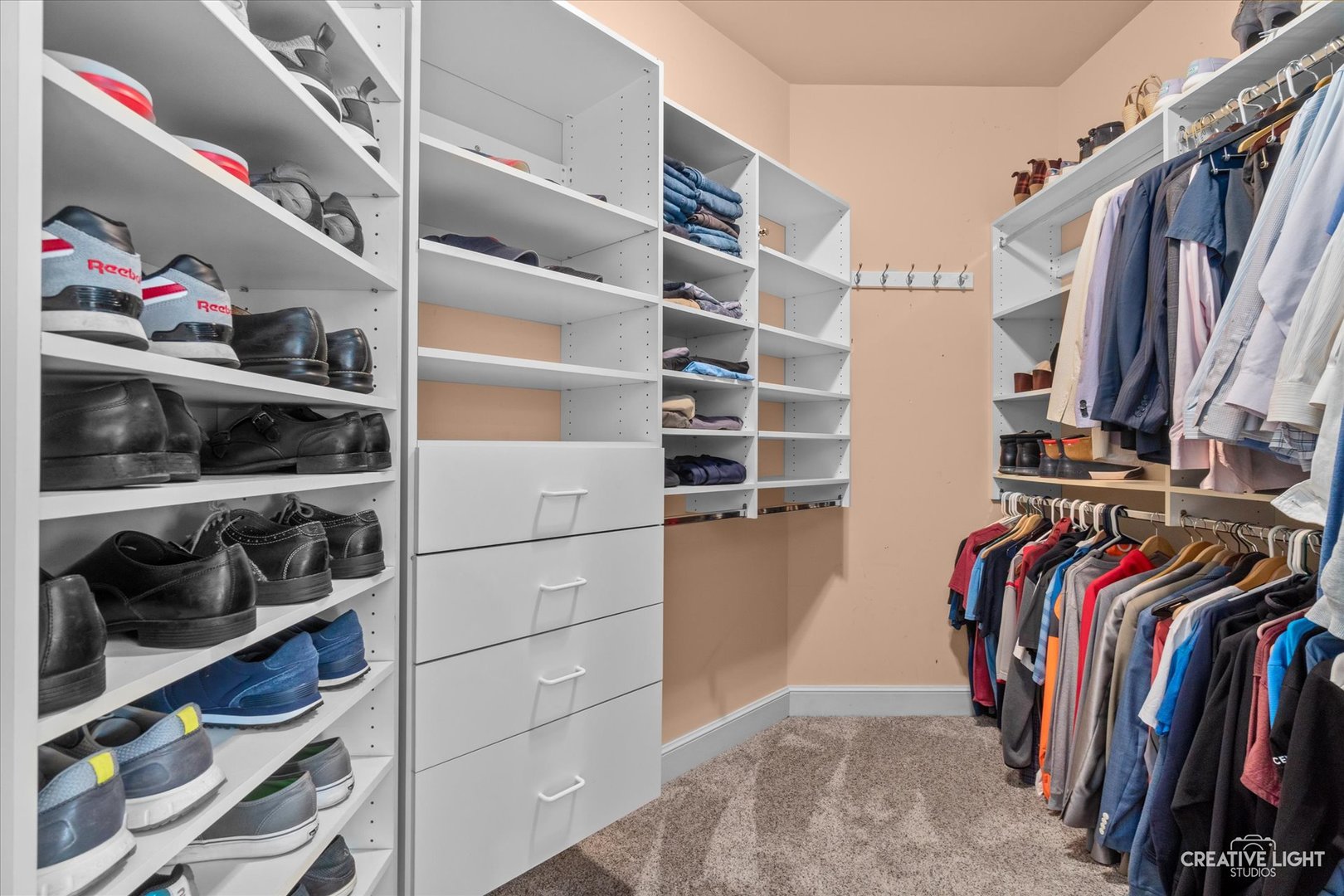 S147 North Mathewson Lane Geneva, IL 60134 - Photo 29 of 75 a view of walk in closet with clothes and shoes