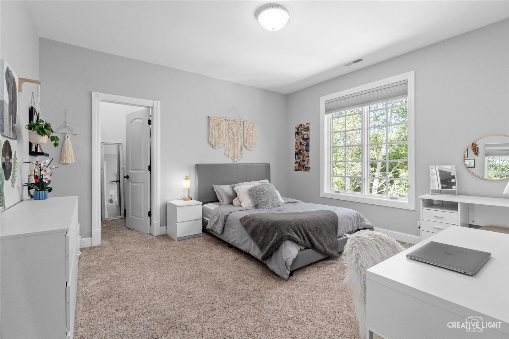 S147 North Mathewson Lane Geneva, IL 60134 - Photo 33 of 75 a spacious bedroom with a bed and a couch