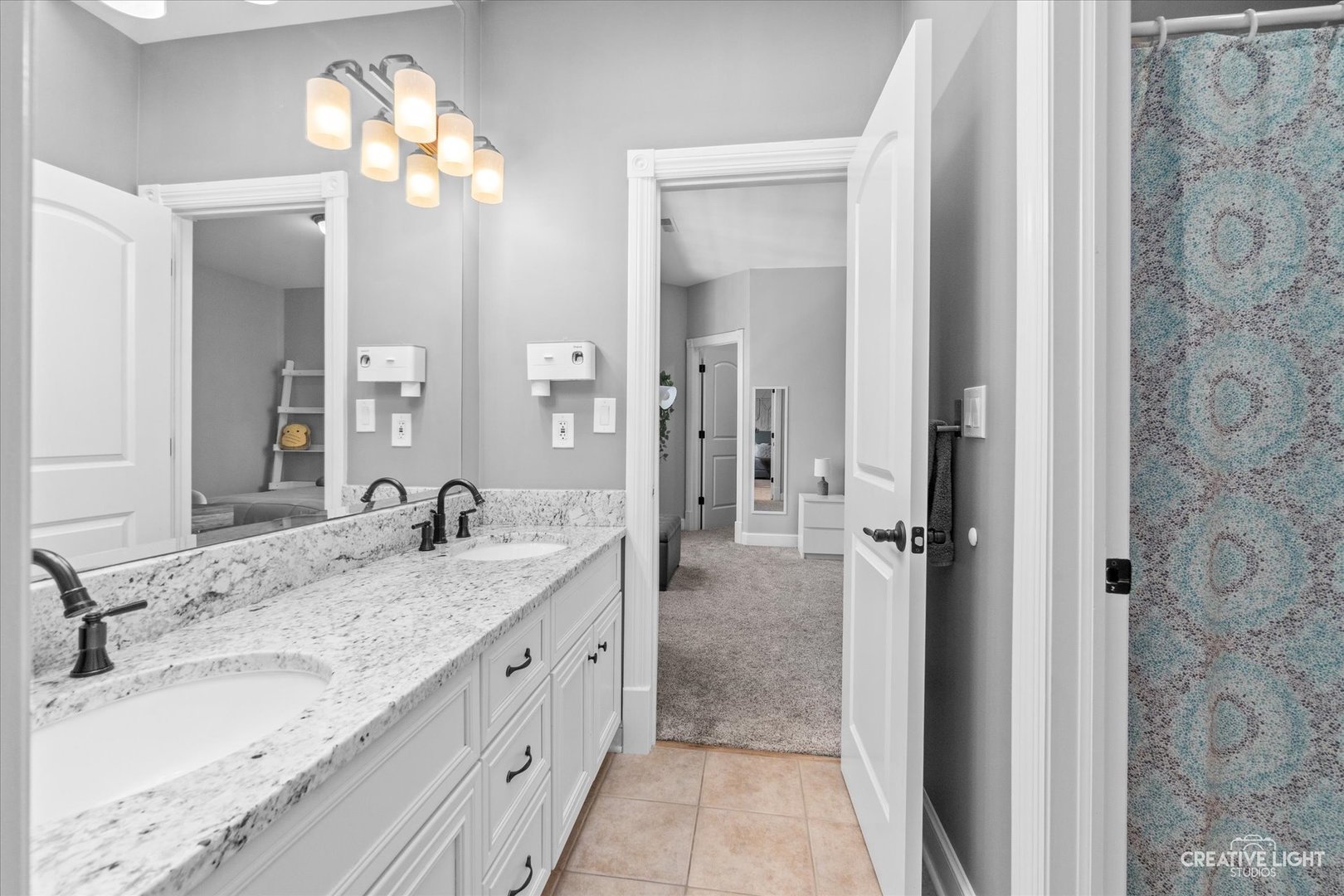 S147 North Mathewson Lane Geneva, IL 60134 - Photo 34 of 75 a bathroom with a granite countertop sink and a mirror