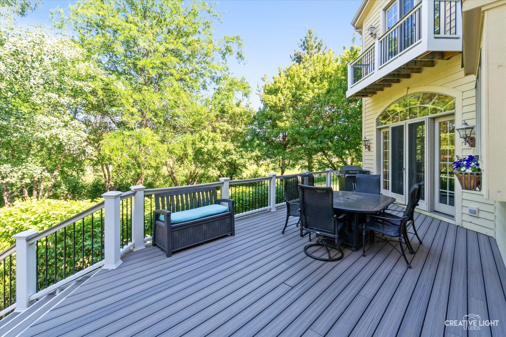 S147 North Mathewson Lane Geneva, IL 60134 - Photo 54 of 75 a view of a deck with table and chairs and wooden floor