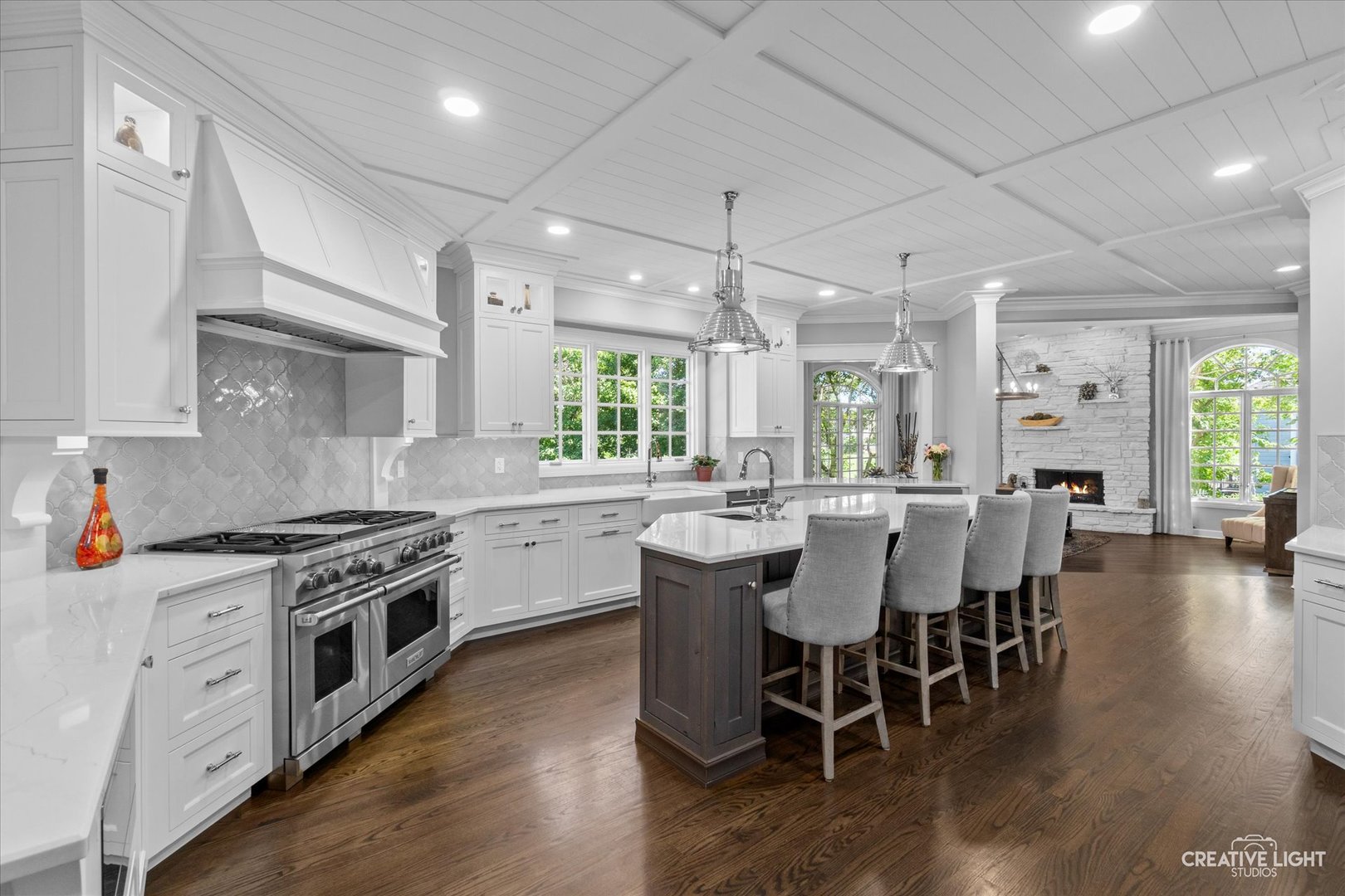 S147 North Mathewson Lane Geneva, IL 60134 - Photo 6 of 75 a kitchen with a dining table chairs wooden floor and stainless steel appliances