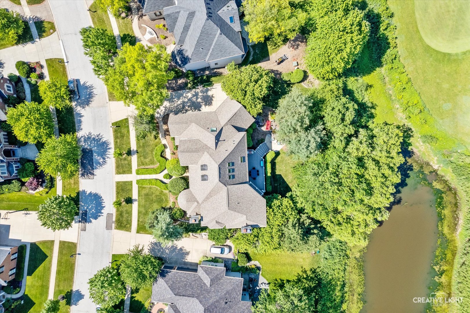 S147 North Mathewson Lane Geneva, IL 60134 - Photo 61 of 75 an aerial view of a house with a garden and swimming pool