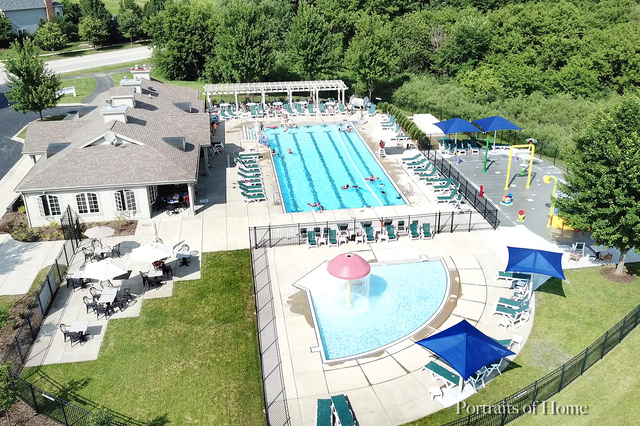 S147 North Mathewson Lane Geneva, IL 60134 - Photo 69 of 75 an aerial view of a house with swimming pool garden and patio