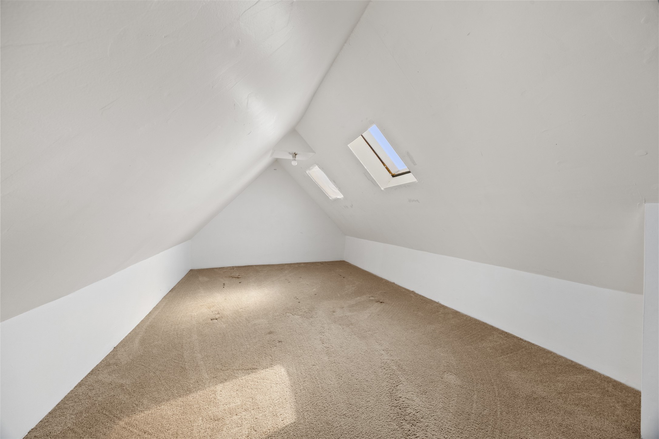 4910 Cark Street Santa Fe, TX 77517 - Photo 23 of 31 an empty room with a workbench