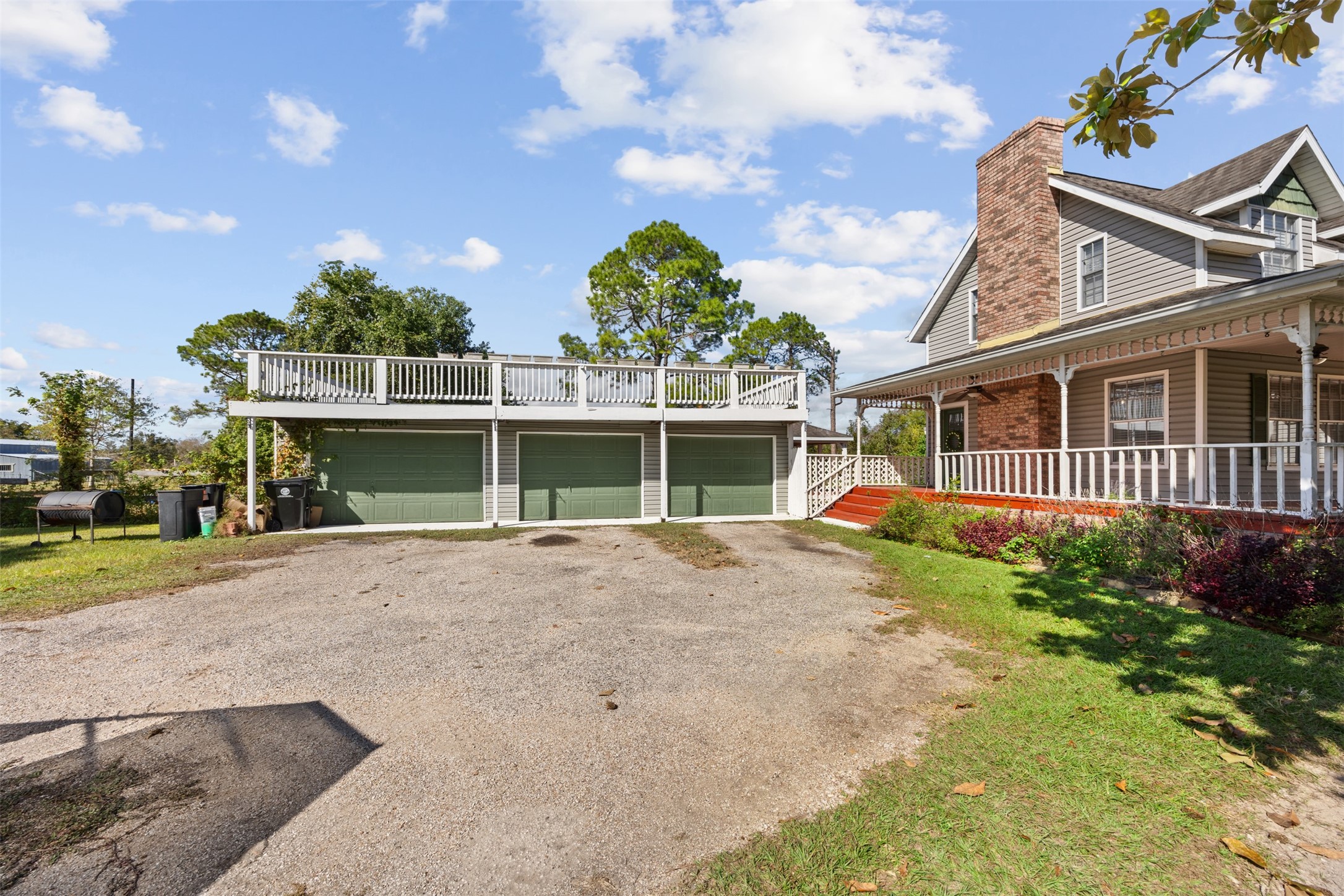 4910 Cark Street Santa Fe, TX 77517 - Photo 28 of 31 a view of a house with a yard and a garden